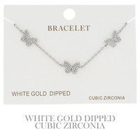 CUBIC ZIRCONIA PAVE BUTTERFLY ADJUSTABLE BRACELET IN YELLOW GOLD AND WHITE GOLD PLATING