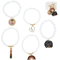 5-PIECE MELANIN POPPIN STACKABLE LAYERING STRETCH MULTI CHARM BEADED BRACELET SET