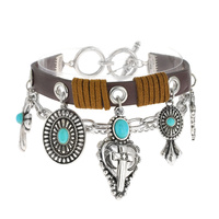 CROSS- WESTERN THEMED MULTI STRAND CHAIN & LEATHER CHARM TOGGLE BRACELET WITH SEMI PRECIOUS TURQUOISE STONE
