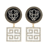 FASHIONISTA 2-TIER PANTHER ENAMEL COATED CRYSTAL RHINESTONE GREEK KEY DANGLE AND DROP EARRINGS IN GOLD TONE METAL