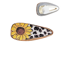 SUNFLOWER COW PRINT FAUX LEATHER HAIR CLIP