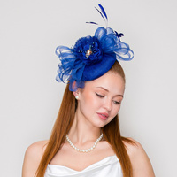 TULLE FLOWER DISC FASCINATOR