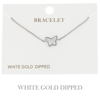 SYNTHETIC MOTHER OF PEARL BUTTERFLY ADJUSTABLE BRACELET IN YELLOW GOLD AND WHITE GOLD PLATING