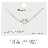 CUBIC ZIRCONIA HEART ADJUSTABLE BRACELET IN YELLOW GOLD AND WHITE GOLD PLATING