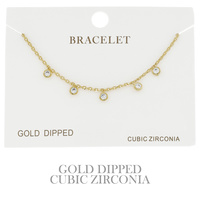 CUBIC ZIRCONIA DISC ADJUSTABLE CHARM BRACELET IN YELLOW GOLD AND WHITE GOLD PLATING