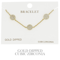 CUBIC ZIRCONIA PAVE DISC ADJUSTABLE BRACELET IN YELLOW GOLD AND WHITE GOLD PLATING