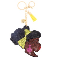 JEWELED BLACK GIRL MAGIC FRINGE JINGLE KEYCHAIN