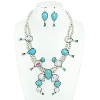 CRYSTAL SQUASH BLOSSOM WITH METAL PEARL