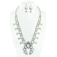 CRYSTAL SQUASH BLOSSOM WITH METAL PEARL