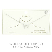 GOLD PLATED CZ BOW PENDANT NECKLACE
