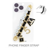 ENAMEL COATED CRYSTAL RHINESTONE PAVE MULTI CHARM BEADED AND LEATHER WOVEN CHAIN PHONE STRAP SET