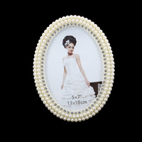 PEARL OVAL FRAME W/DIAMONDS 5X7