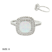 ENGAGEMENT STYLE RING W/ OPAL CENTER STONE